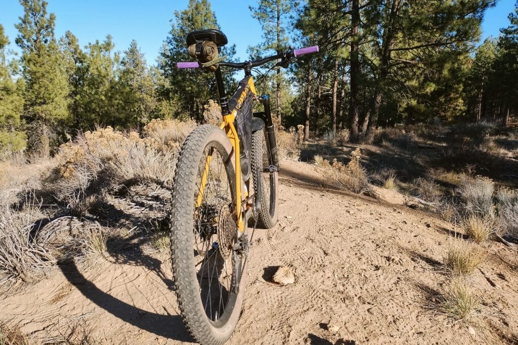 Rear view of a Ritchey Ultra with a DIY roll top saddle bag attached.