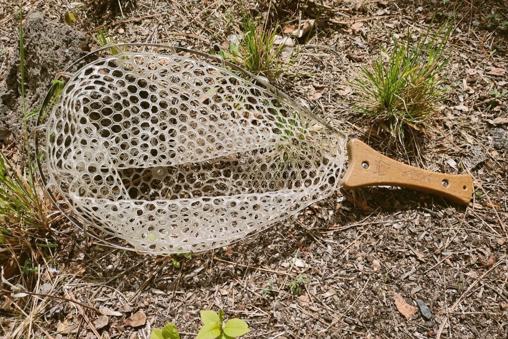 Handy Pak Net laying in a garden.